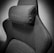 A high-quality, fabric gaming chair featuring ergonomic design and enhanced comfort. The chair has a distinct headrest with visible stitching, embossed branding, and a modern aesthetic.